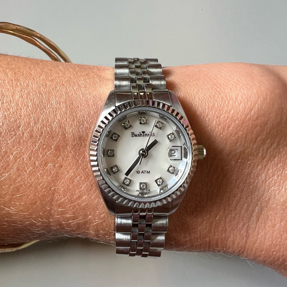 Women’s stainless and diamond watch